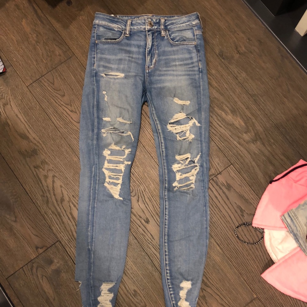 American Eagle distressed light wash skinny jeans